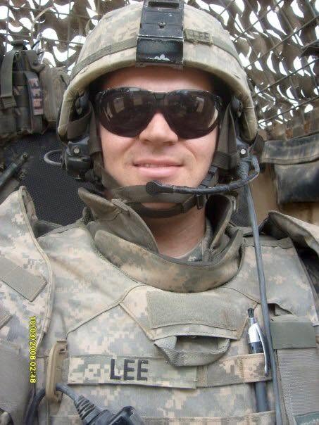 Shawn Lee in U.S. Army helmet, sunglasses, and tactical vest with name tape LEE, 2008